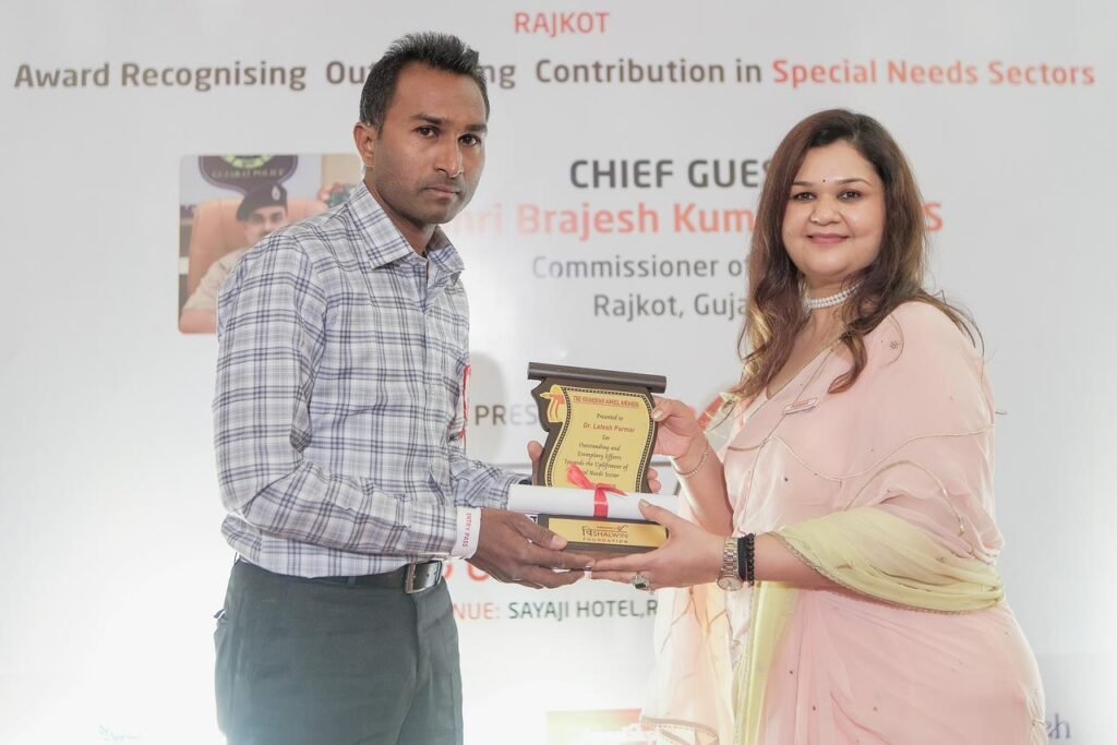 Rajkot, Gujarat: In recognition of his exceptional contribution towards the welfare and empowerment of persons with disabilities, social worker Dr. Latesh Parmar has been conferred with the prestigious Guardian Angel Award 2026. The award was presented during the 6th Guardian Angel Award Ceremony organized by Vishelvin Foundation, Ahmedabad, at Sayaji Hotel in Rajkot. Dr. Parmar, a resident of Samli Village in Godhra Taluka of Panchmahal District, Gujarat, was honoured in the Social Worker Category for his dedicated efforts in promoting inclusion, accessibility, and equal opportunities for persons with disabilities. The Guardian Angel Awards are presented annually to individuals who have made significant contributions to improving the lives of differently-abled persons. This year, a total of 89 individuals from various districts of Gujarat were recognised for their remarkable work in the disability sector. The award ceremony was attended by several distinguished dignitaries. Shri Brijesh Kumar Jha (IPS), Police Commissioner of Rajkot City, graced the occasion as the Chief Guest, while Shri Tushar Sumera (IAS), Municipal Commissioner of Rajkot Municipal Corporation, attended as the Guest of Honour. Among other notable attendees were Captain Ashwin Solanki, Chief Nautical Officer of Gujarat Maritime Board, and Dr. Milankumar Pandit, District Social Security Officer, Rajkot, who appreciated the efforts of social workers and organisations working towards disability empowerment and social inclusion. The event was organised under the leadership of Mrs. Poonam G. Kaushik, Managing Trustee of Vishelvin Foundation, along with Mr. Gaurav Kaushik and the foundation’s dedicated team. The ceremony aimed to acknowledge individuals who have played a meaningful role in creating a more inclusive and accessible society. Speaking on the occasion, organisers highlighted the importance of recognising grassroots social workers who continue to make a positive impact in the lives of vulnerable communities. Dr. Latesh Parmar’s recognition reflects his years of commitment towards supporting persons with disabilities and advocating for their rights, dignity, and equal participation in society. His work continues to inspire communities across Gujarat and serves as an example of how dedicated social service can bring meaningful change. The honour further reinforces the growing importance of disability welfare initiatives in India and the need for continued efforts towards building an inclusive society where every individual is given equal opportunities to thrive.